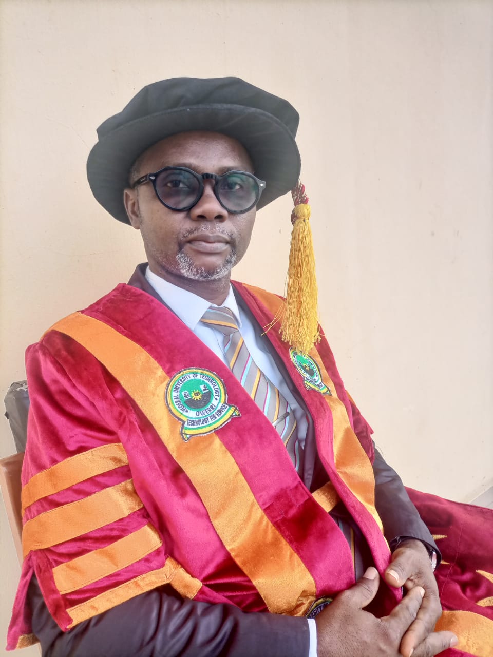 FUTO Gown Sitting Portrait